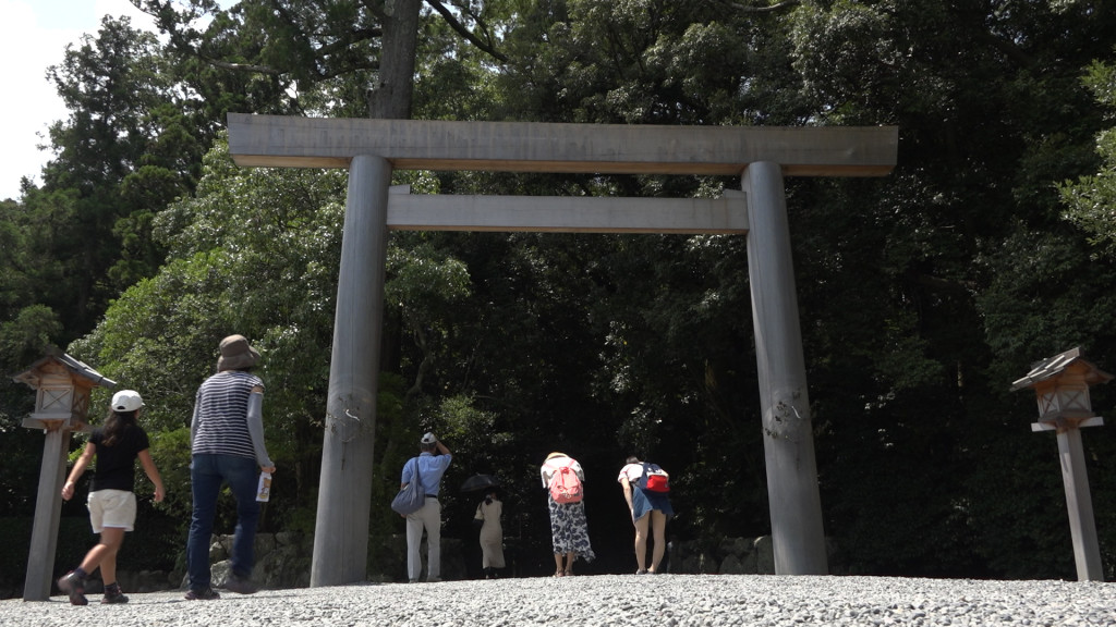 Bowing at Torii gate.